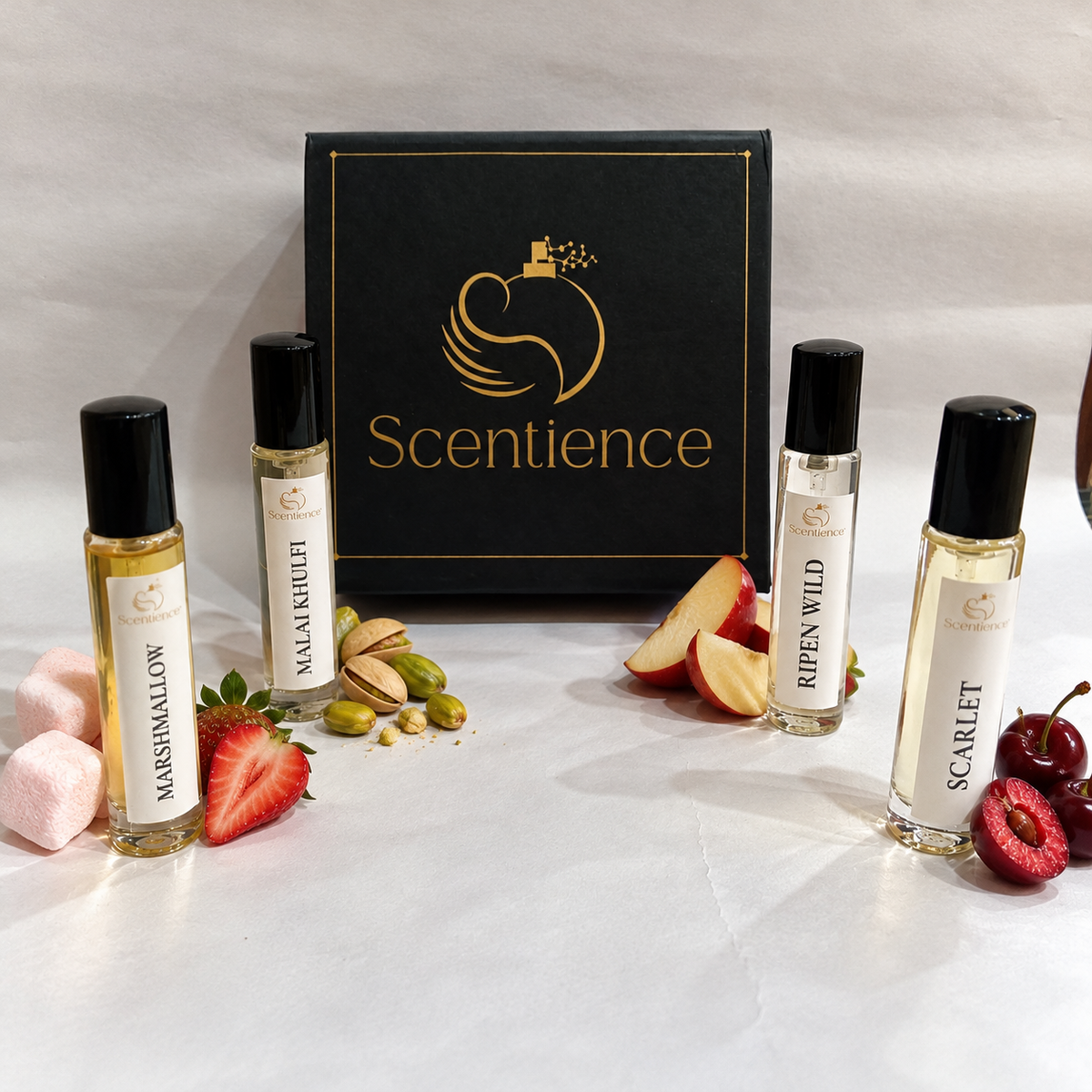 Scentience Discovery Set Gourmand Collection with four 15ml Extrait de Parfum roll-on vials: Marshmallow, Malai Khulfi, Ripen Wild and Scarlet