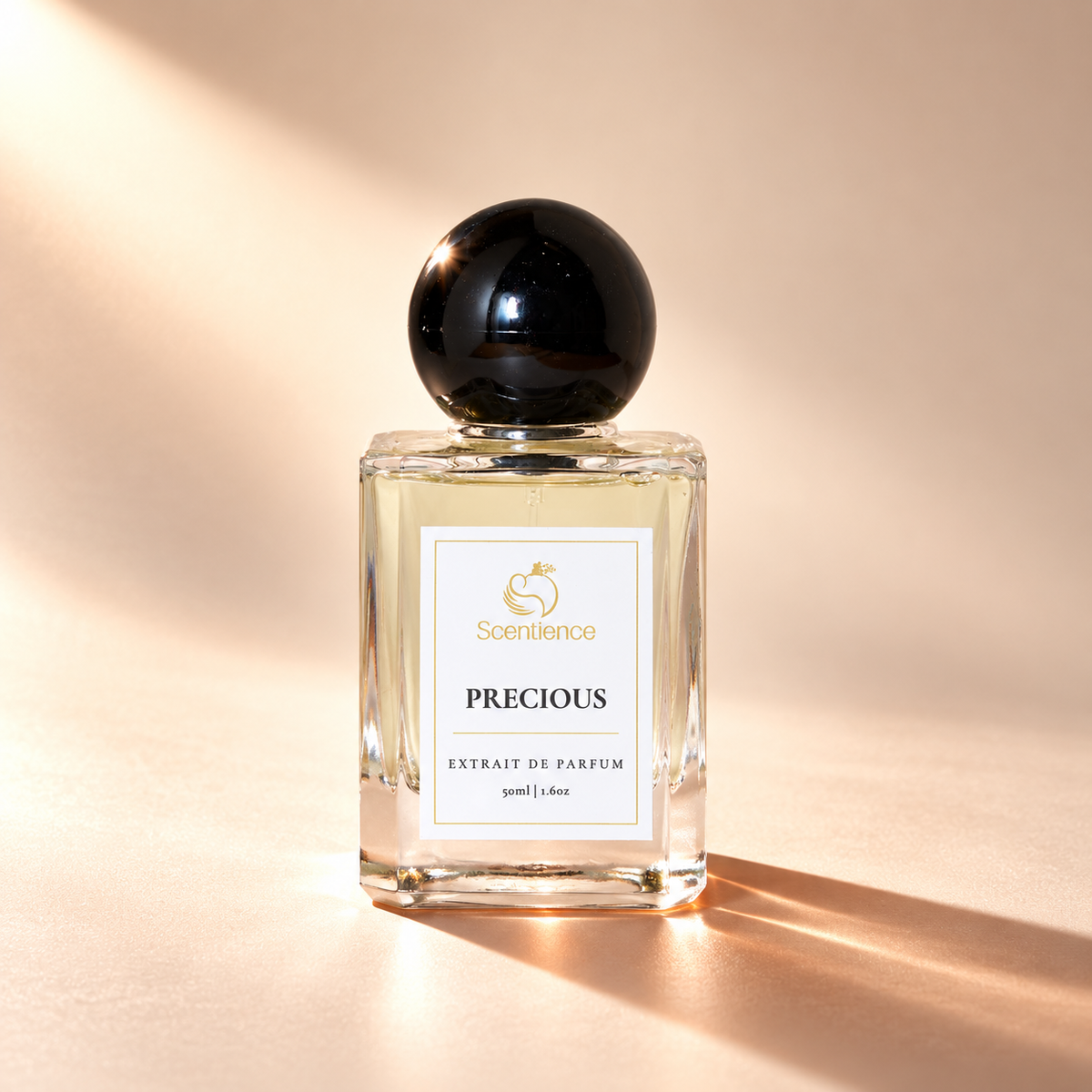 Scentience Precious extrait de parfum 50ml bottle in soft studio light on a warm peach studio background